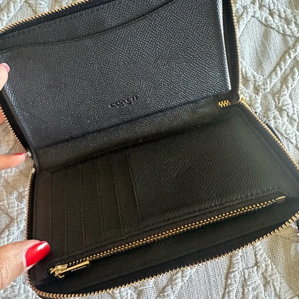 Coach wristlet zip around black pebble wallet